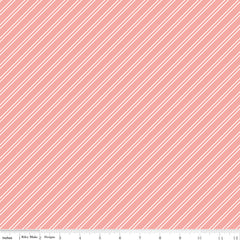 Between The Pages Coral Stripes Yardage by Fran Gulick for Riley Blake Designs